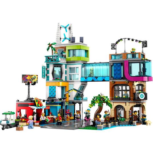 LEGO City 60380 Downtown, Modular Building Set con Negozio, Barbiere,  Studio Blogging, Hotel, Discoteca e 14 Minifigure - LEGO - My City -  Edifici e architettura - Giocattoli