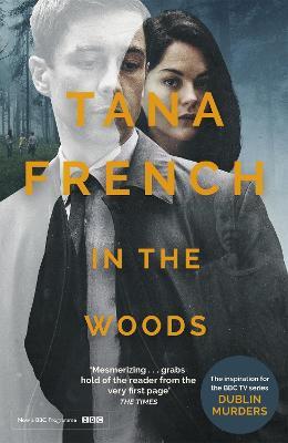 In the Woods: A stunningly accomplished psychological mystery which will take you on a thrilling journey through a tangled web of evil and beyond - to the inexplicable - Tana French - cover