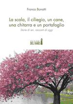 La scala, il ciliegio, un cane, una chitarra e un portafoglio