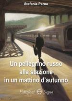 Un pellegrino russo alla stazione in un mattino d'autunno