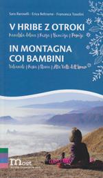 V hribe z otroki-In montagna coi bambini. Valcanale, Resia, Slavia, Alta valle dell'Isonzo. Ediz. bilingue