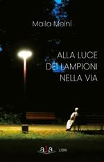 Alla luce dei lampioni nella via