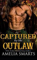 Captured by the Outlaw: A Dark Western Romance